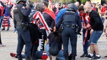 [FOTO] Kaos na ulicama Madrida; policija pendrecima na navijače Atletica, a gradonačelnik strahuje da bi posljedice proslave mogle biti strašne