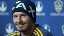 Becks svuda stiže, nosi i olimpijsku baklju