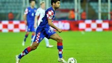 Croatia beats Latvia to make Euro playoff