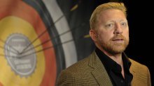 Boris Becker suosjeća s Woodsom