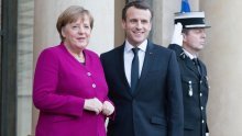 Macron i Merkel žele vraćati migrante u zemlje u kojima su ušli u EU