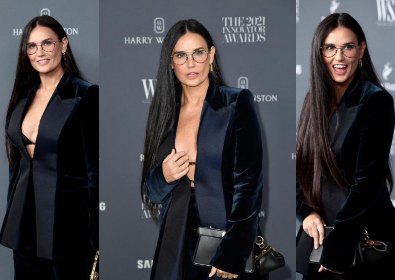 Izdanje koje će se dugo pamtiti: Demi Moore odjenula je sjajno odijelo od baršuna, no nitko nije mogao skrenuti pogled s njezinog dekoltea