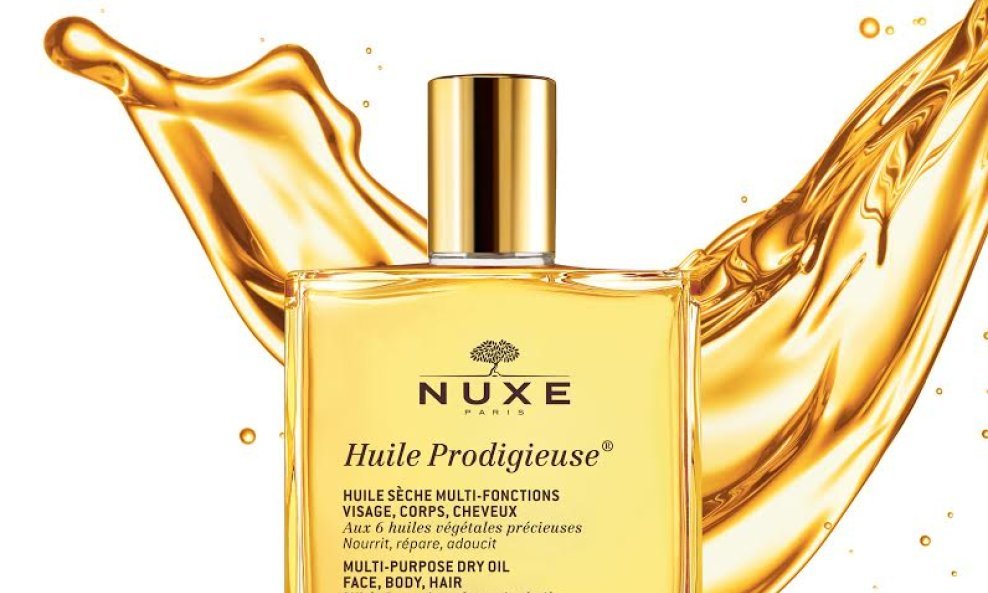 Nuxe Huile Prodigieuse® ili Čudesno suho ulje višenamjenski je proizvod za njegu tijela, lica i kose, a njegova tajna krije se u koktelu čak 6 biljnih ulja – lješnjak, makadamija, slatki badem, kamelija, gospina trava, borago - te je iznimno bogato vitami