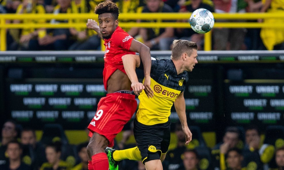 Kingsley Coman (Bayern) i Lukasz Piszczek (Borussia)