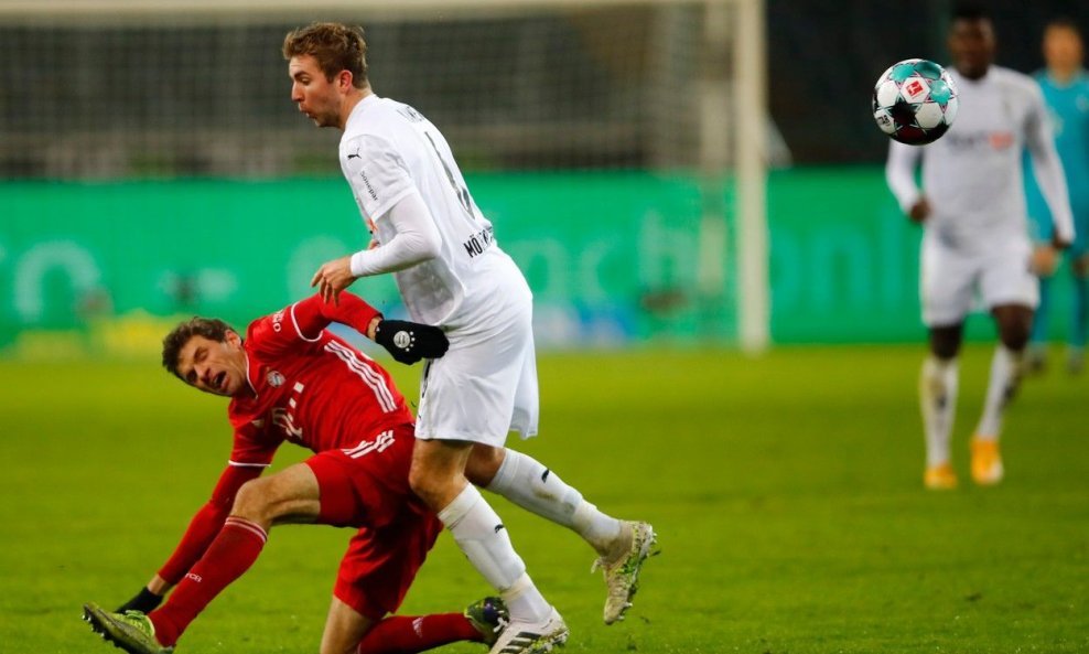 Christoph Kramer (u bijelom dresu)  vs. Thomas Müller