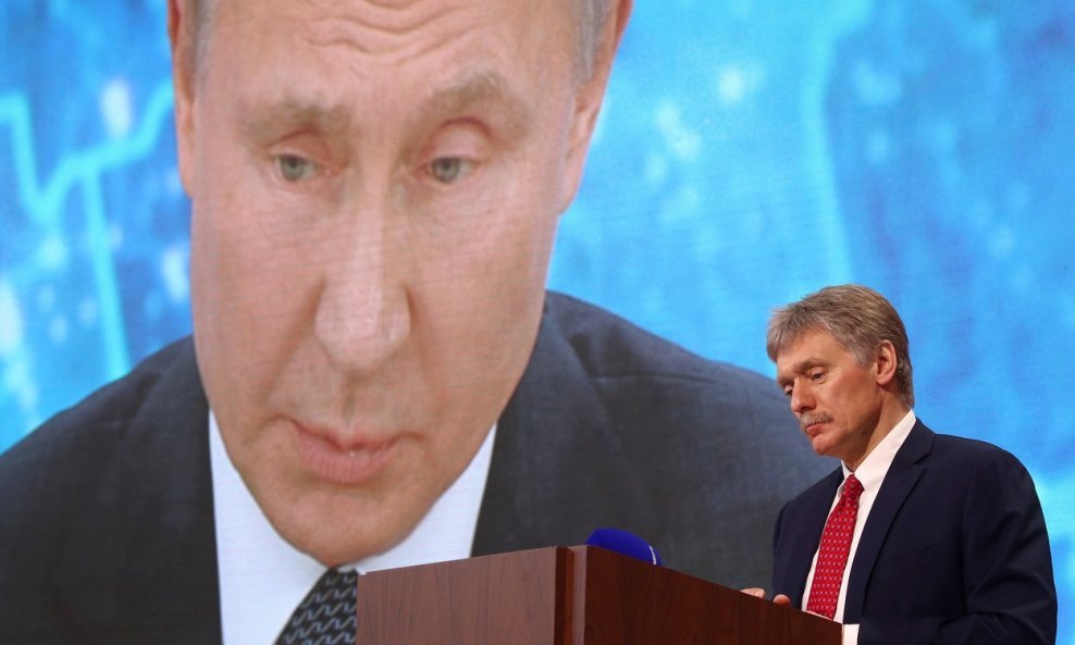 Vladimir Putin i Dimitrij Peskov