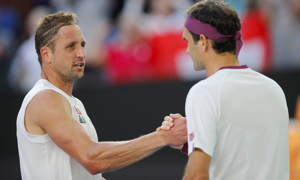 Tennys Sandgren i Roger Federer