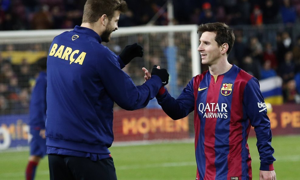 Gerard Pique i Lionel Messi