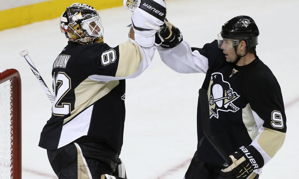 Pascal Dupuis i Tomas Vokoun