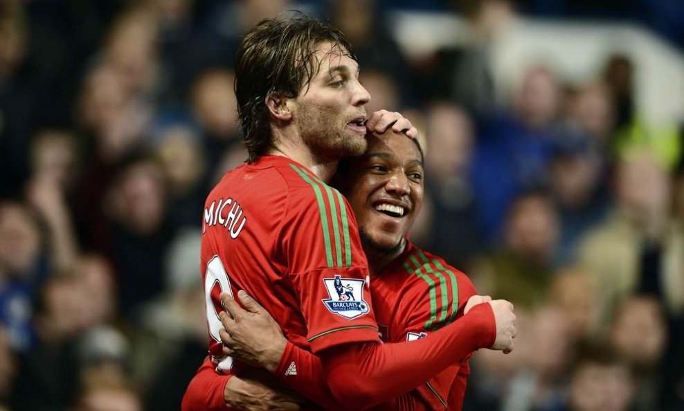 Michu (L) i Jonathan de Guzman (Swansea City)