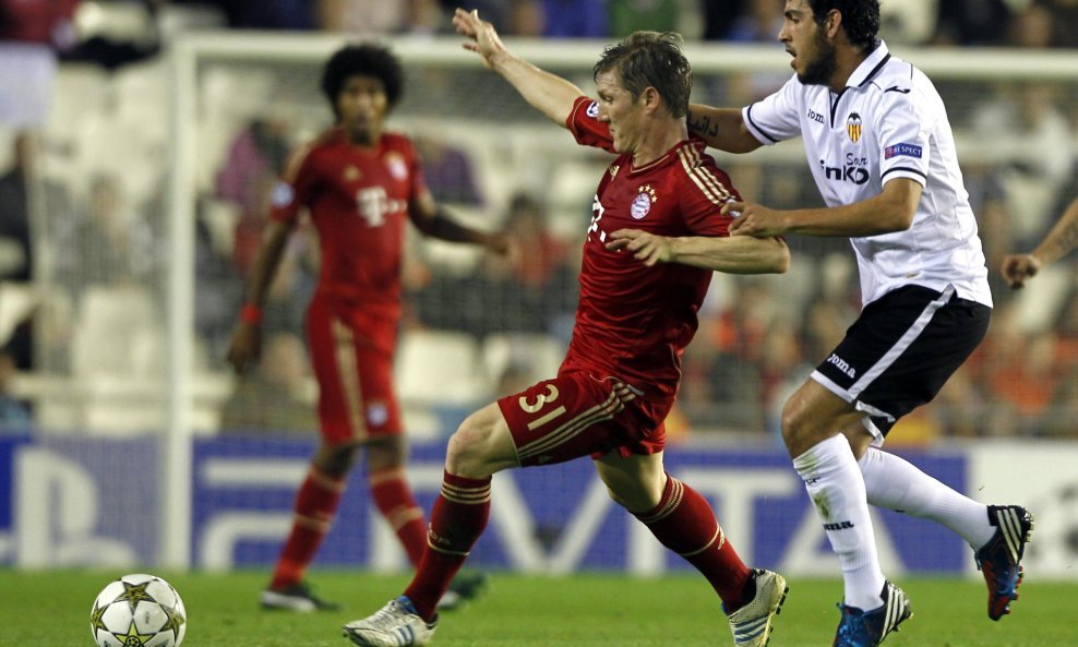 Bastian Schweinsteiger i Daniel Parejo