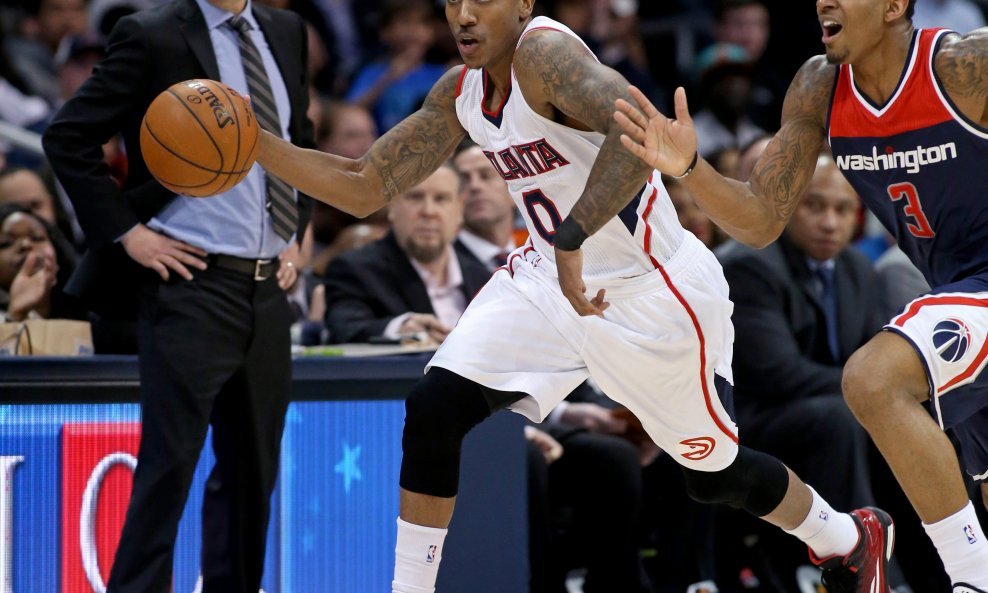 Atlanta Hawks – trener Mike Budenholzer i Jeff Teague