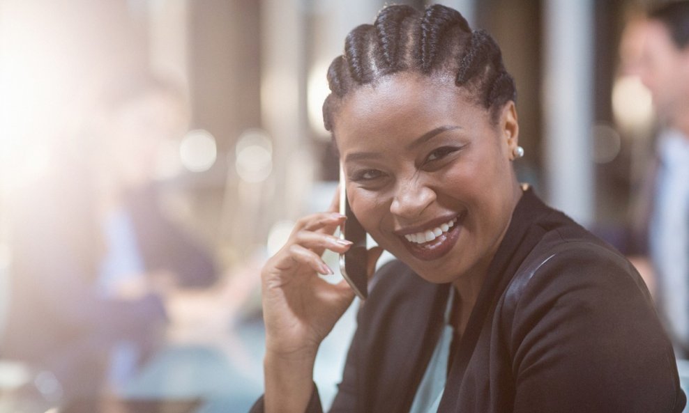 Portrait of businesswoman talking mobile phone in the office